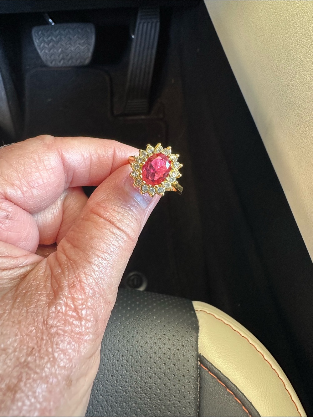 Gold Ring with Pink Center Stone and Halo Accents
